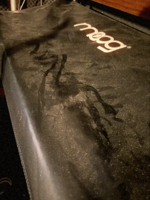 Moog synthesizer under its dust cover