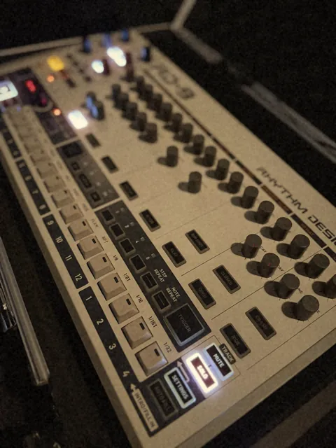 Behringer RD-9 drum machine with lit step buttons